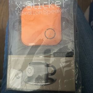 X-Dream X-Sticker Vibration Speaker Turn Anything Into A Speaker orange